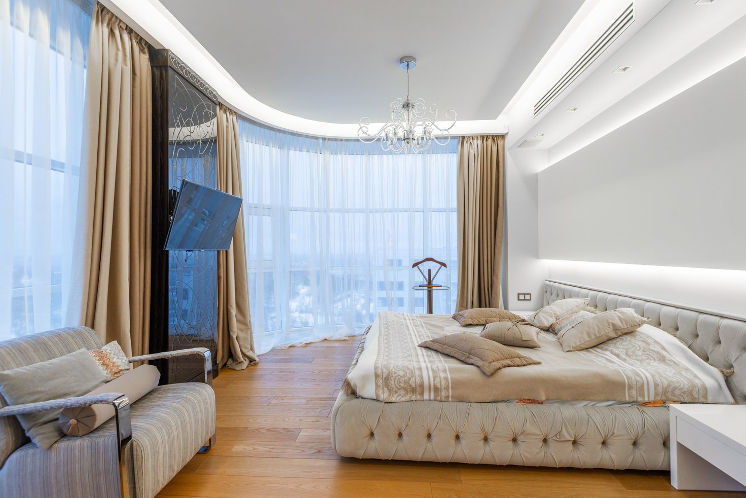 Spacious bedroom in luxury apartment